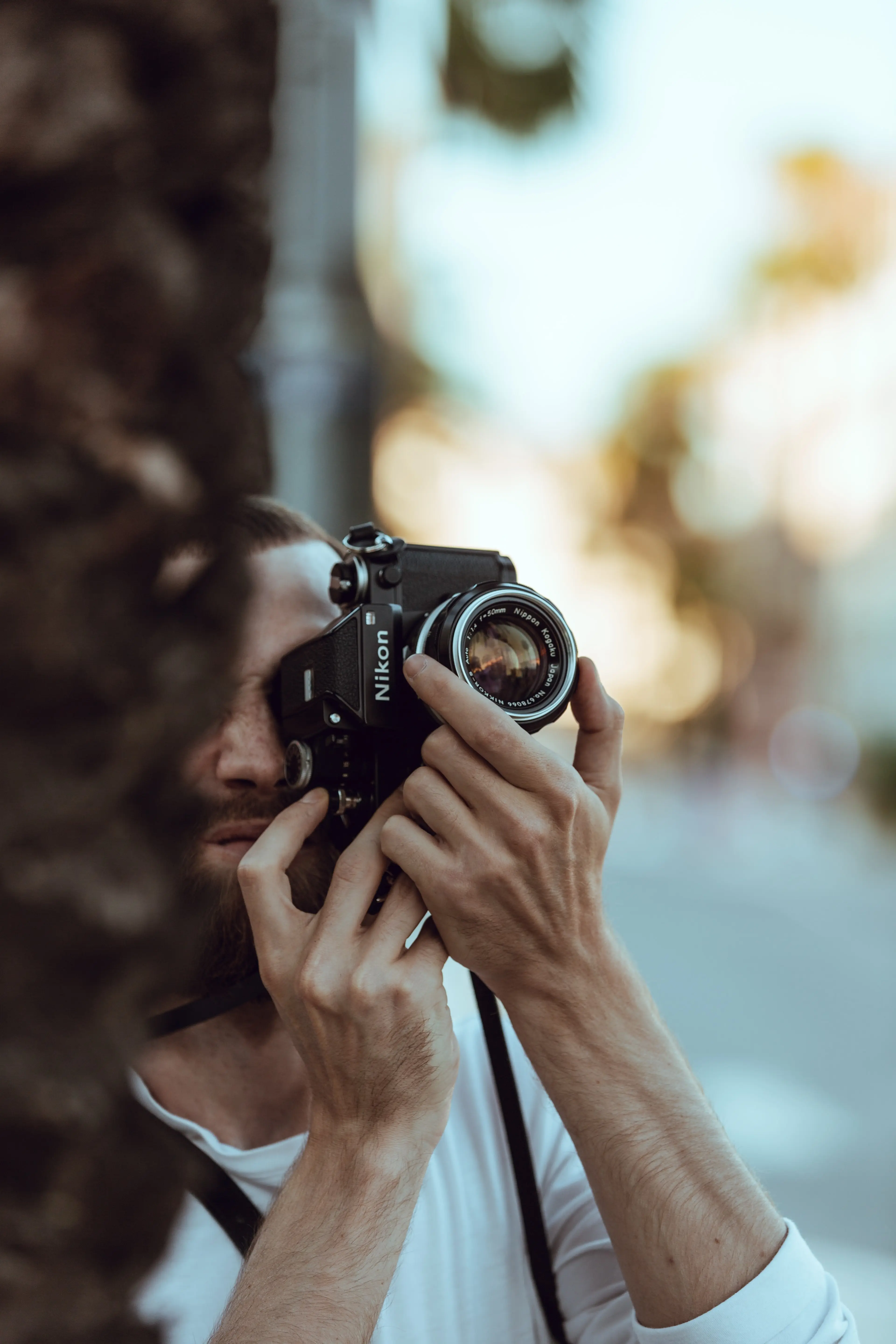 a guy holding a camera